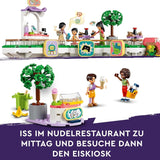 LEGO Store Friends Hračka domeček pro panenky Heartlake City pro dívky a chlapce Sada figurek podporuje sociálně-emocionální rozvoj dárek pro 8 let 42604 Stavebnice Besuche den LEGO-Store