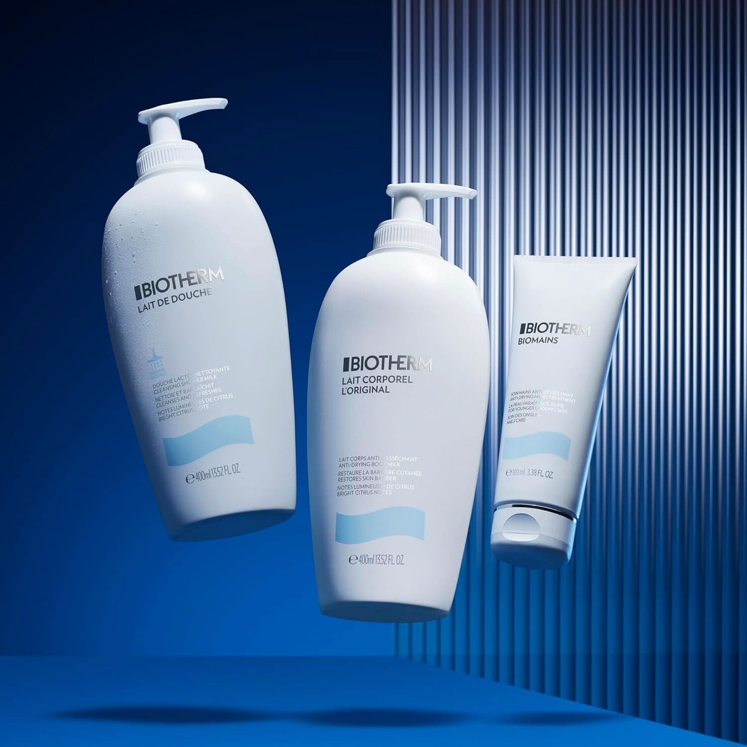 Biotherm, povzbuzující sprchové mléko pro intenzivní hydrataci a pocit hladkého těla, 400 ml Sprcha a koupel Naty Shop
