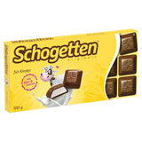 Schogetten pro děti, čokoládová tyčinka 100g, mléčná čokoláda s krémovou mléčnou náplní, vhodně porcovaná. Delikatesa. Kousek po kousku.