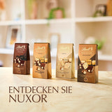 Lindt Čokoláda | Směs pro sáček NUXOR | 103 g | Gianduja smetanové čokoládové kostky ve třech sortimentech s praženými celými lískovými oříšky | Čokoládový dárek