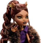 Panenka Monster High Dům vlků Clawdeen Wolf Sběratelská figurka s umělou kožešinou Žakárový kabát Purpurová bunda Šaty Zlaté Kalhoty a doplňky JDR66