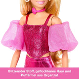 Panenka Barbie Deluxe Style #5 v metalicky růžovém blond oblečku s třpytivým živůtkovým topem a třpytivými kalhotami, s doplňky včetně růžového náhrdelníku a kabelky, JFP40