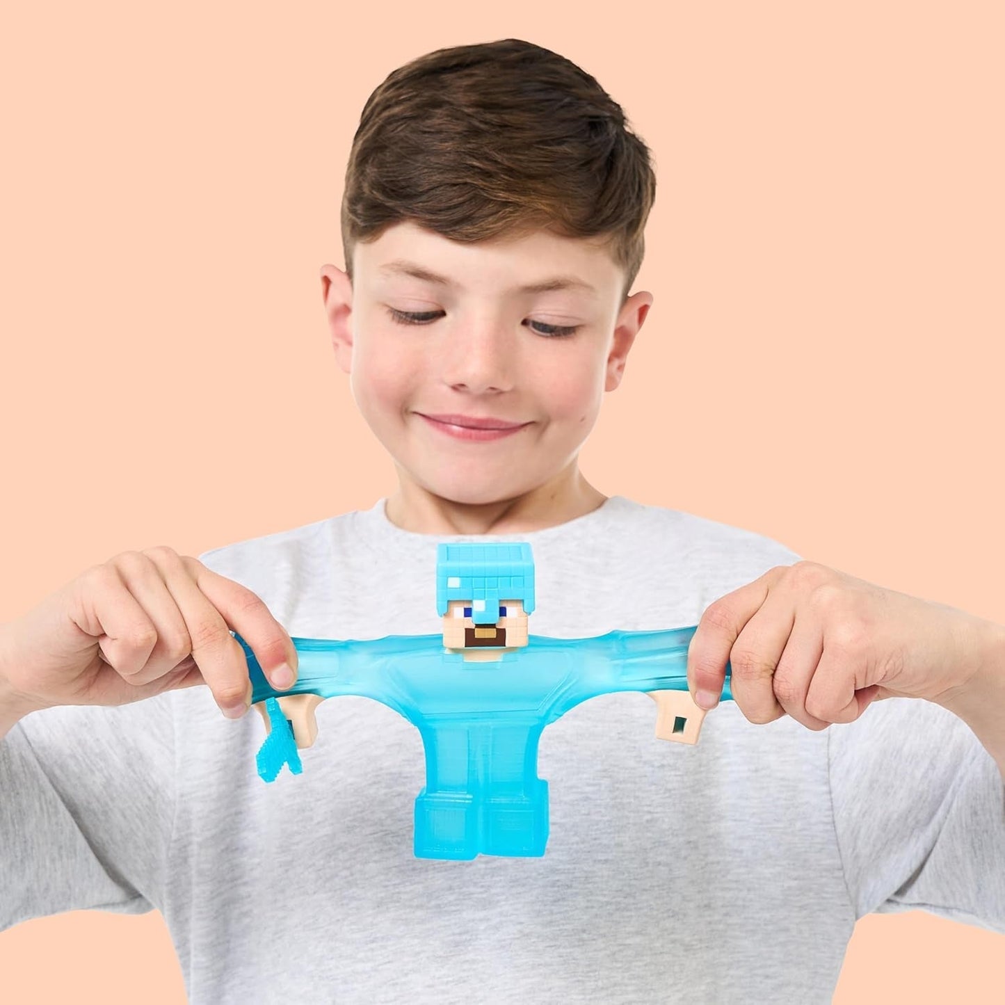 Heroes of Goo Jit Zu - Rozšiřitelná figurka Minecraftu - Steve s diamantovým brněním a mečem, super strečová Goo výplň se skrytým diamantovým prvkem uvnitř, rozšiřitelná na 3x velké akční figurky Naty Shop