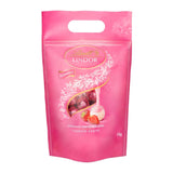 Čokoládová směs LINDOR | 1371 g | Přibl. 109 kuliček: Mléčná čokoláda a kuličky LINDOR s jahodovým krémem | 1 kg pytel, cca. 80 čokoládových kuliček bílá čokoláda s jahodovým krémem