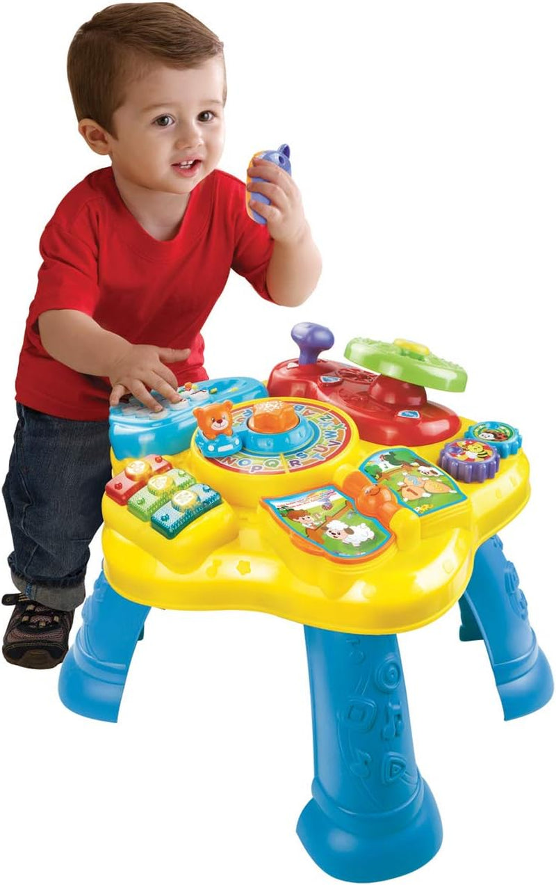 VTech Baby Adventure Play Table - Barevný hrací stůl pro miminka se 6 hracími poli a interaktivními prvky a Baby My First Song Book 6stránková barevná kniha a pohyblivé prvky pro hraní Bebe Toys Naty Shop