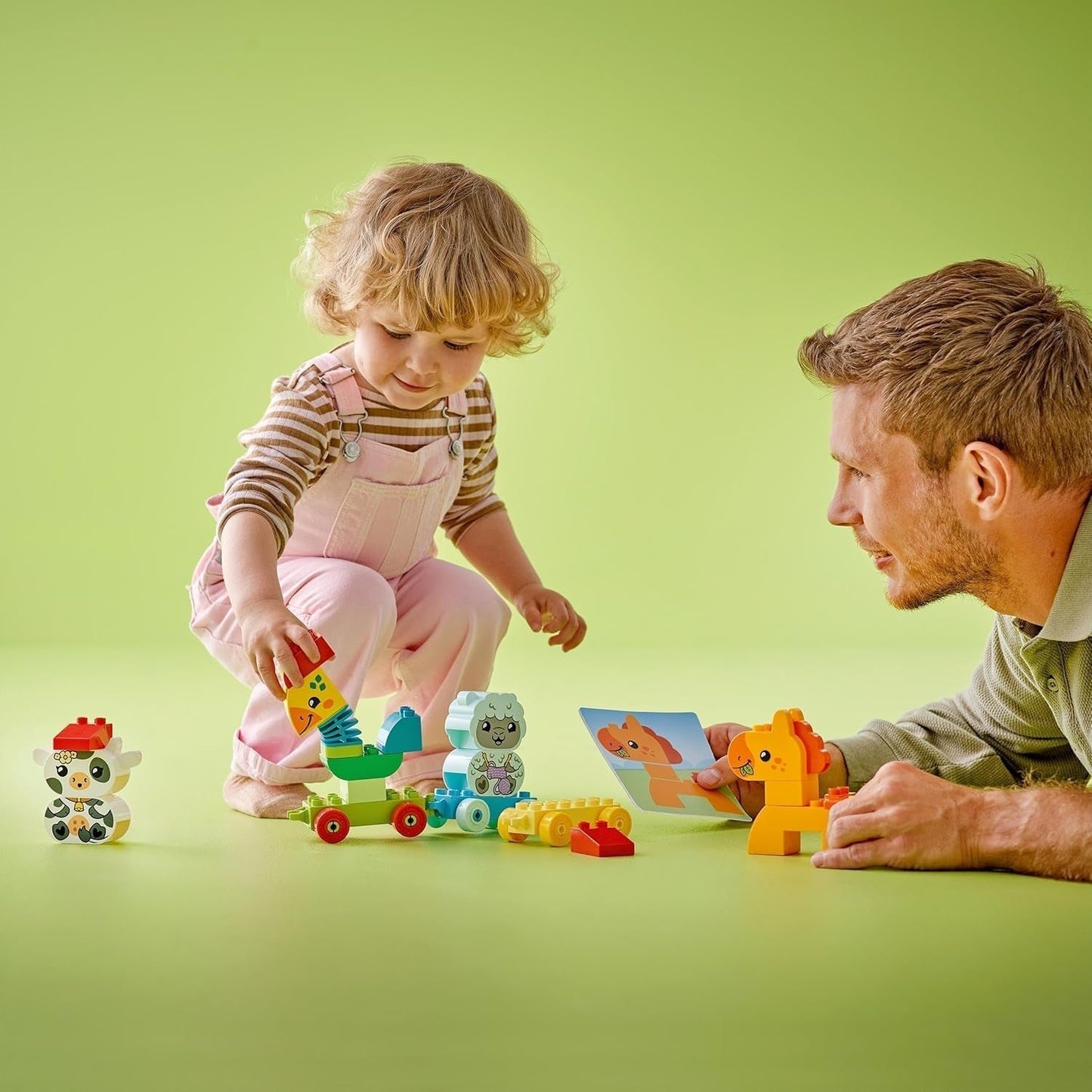 LEGO DUPLO Zvířecí vláček, Vláček s koly, Kreativní stavění a přestavování figurek zvířat, Vzdělávací hračka pro batolata, Dárek k narozeninám pro milovníky zvířat Dívky a chlapce 1½ roku staré 10412 Stavebnice Besuche den LEGO-Store
