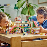 LEGO Store Friends Hračka domeček pro panenky Heartlake City pro dívky a chlapce Sada figurek podporuje sociálně-emocionální rozvoj dárek pro 8 let 42604 Stavebnice Besuche den LEGO-Store