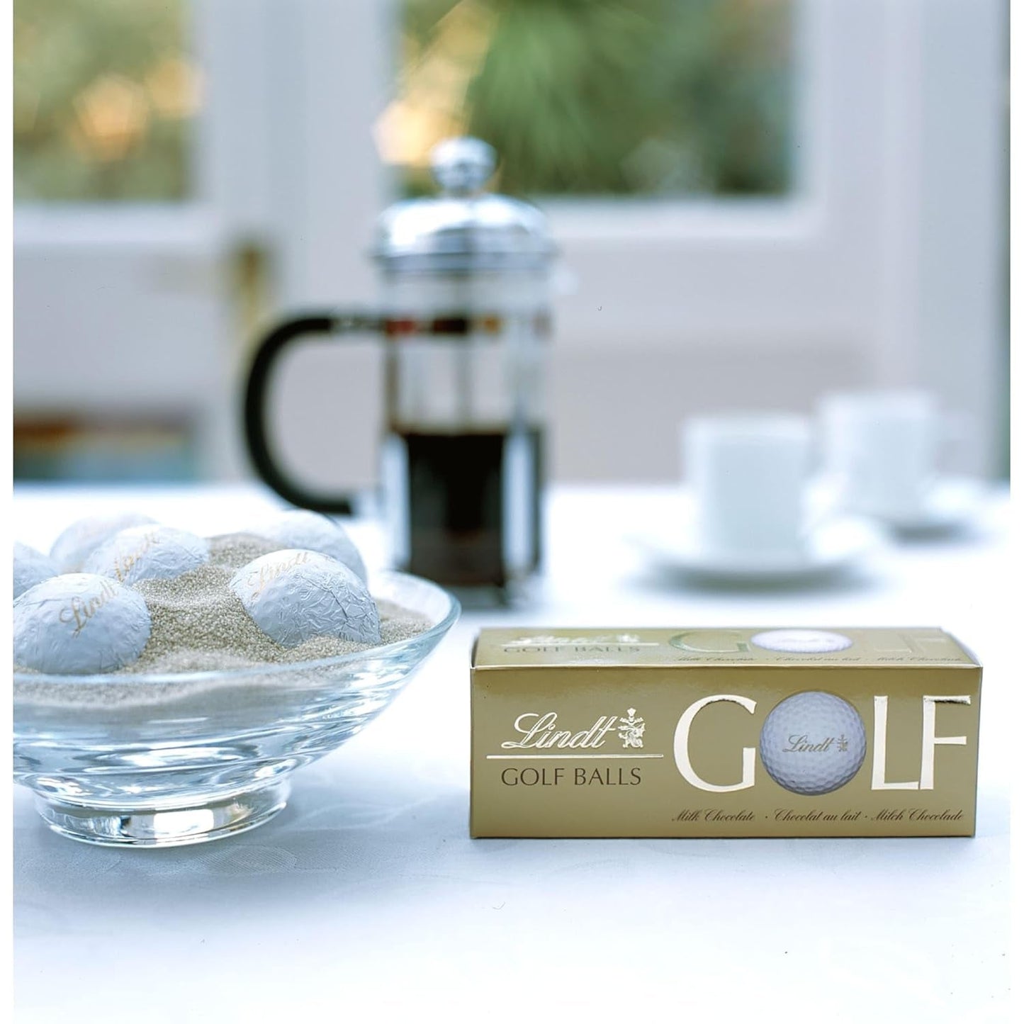 Lindt Schokolade - Golfové míčky | 110 G| Drei Golfbälle Aus Lindt Vollmilch-Schokolade Mit Nougatcremefüllung Und Waffelstückchen | Pralinengeschenk | Dárek pro golfistu | Schokoladengeschenk Naty Shop
