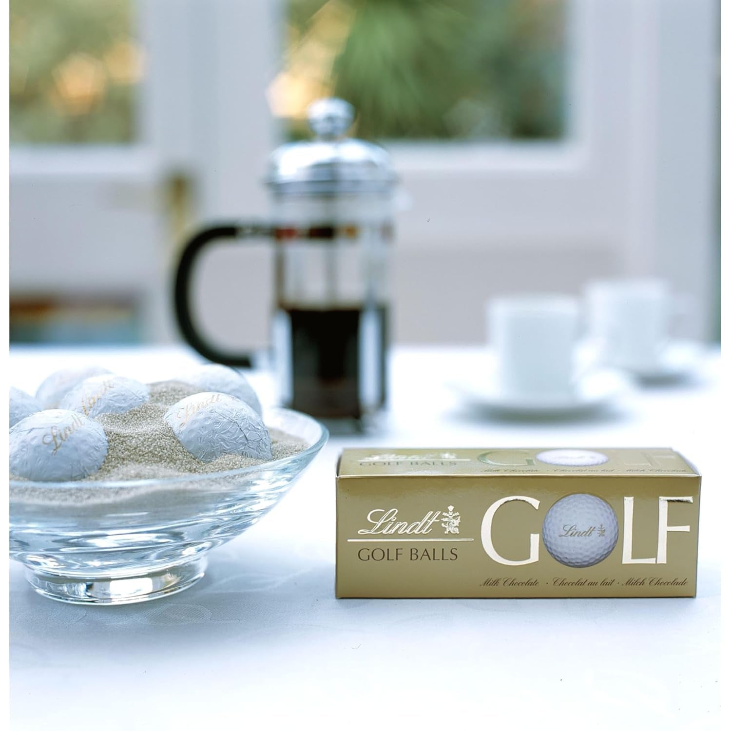 Lindt Schokolade - Golfové míčky | 110 G| Drei Golfbälle Aus Lindt Vollmilch-Schokolade Mit Nougatcremefüllung Und Waffelstückchen | Pralinengeschenk | Dárek pro golfistu | Schokoladengeschenk Naty Shop