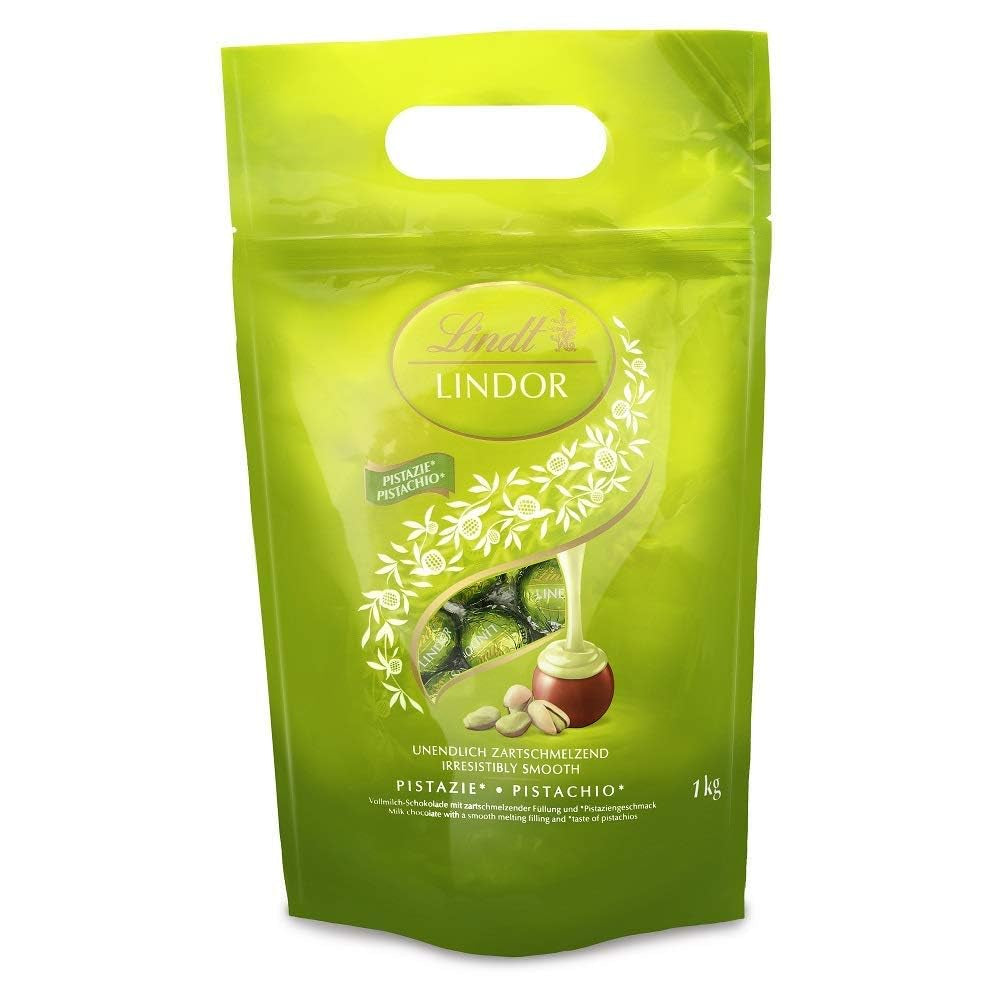 Lindt LINDOR Čokoláda s pistáciemi | 1 kg uzavíratelný sáček | cca. 80 mléčných čokoládových kuliček s pistáciovou krémovou náplní rozplývající se v ústech | Velké balení, pralinkový dárek