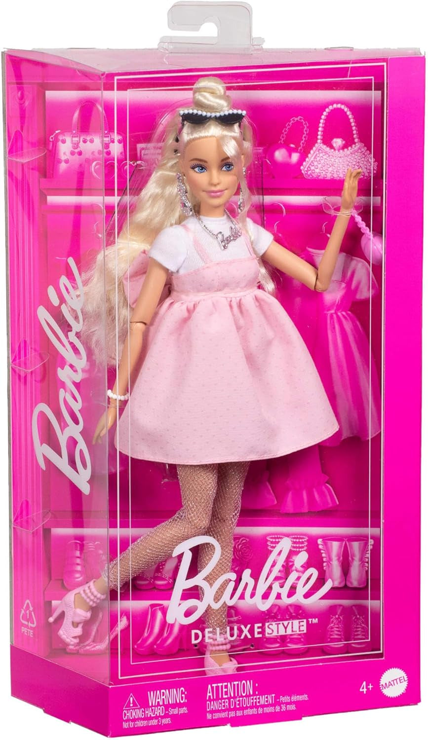 Panenka Barbie Deluxe Style č. 3 with Barbiecore outfit, blonde hair in a high bun, pastel pink dress with oversized bow and accessories like fishnet tights, HYV27
