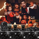 49dílná sada papírových příborů Halloween Spider včetně talířů, ubrousků, sklenic a ubrusu. Černá sada nádobí s dezertními talířky, ubrousky a skleničkami.