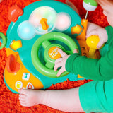 Bright Starts, dětský volant, Lights & Colors Driver, s hudbou, zvuky auta, ukazateli, řadicí pákou a dalšími hračkami Bebe Naty Shop