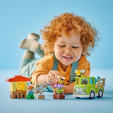 LEGO DUPLO Městské včelaření a úly, vzdělávací hračka pro batolata se 2 figurkami a pojízdným vozíkem, sada na stavění a přestavování, hračka pro batolata od 2 let 10419 stavebnice Besuche den LEGO-Store
