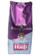 Káva Caffè Haiti Roma Maxi Aroma v 1 kg balení. Vyvážená směs, řemeslně pečená, vyrobená v Itálii.