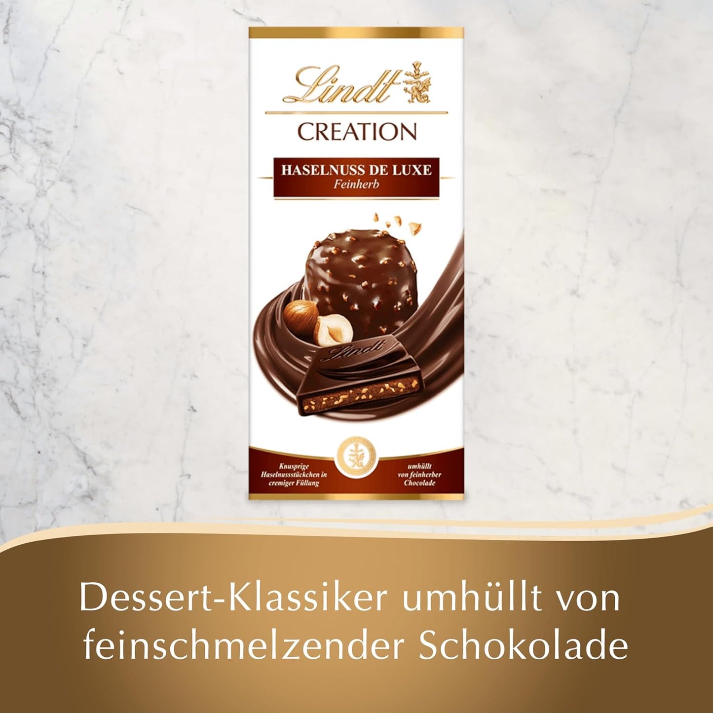 Lindt Creation Hazelnut De Luxe Bar - Hořká čokoláda s křupavými lískovými oříšky ve smetanové náplni
