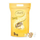Lindt Čokoláda | LINDOR Cheesecake Bag | 1 kg | 80 bílých mléčných čokoládových kuliček s tvarohovou náplní rozplývající se v ústech | Dárek čokolády ke sdílení