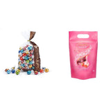 Čokoládová směs LINDOR | 1371 g | Přibl. 109 kuliček: Mléčná čokoláda a kuličky LINDOR s jahodovým krémem | 1 kg pytel, cca. 80 čokoládových kuliček bílá čokoláda s jahodovým krémem