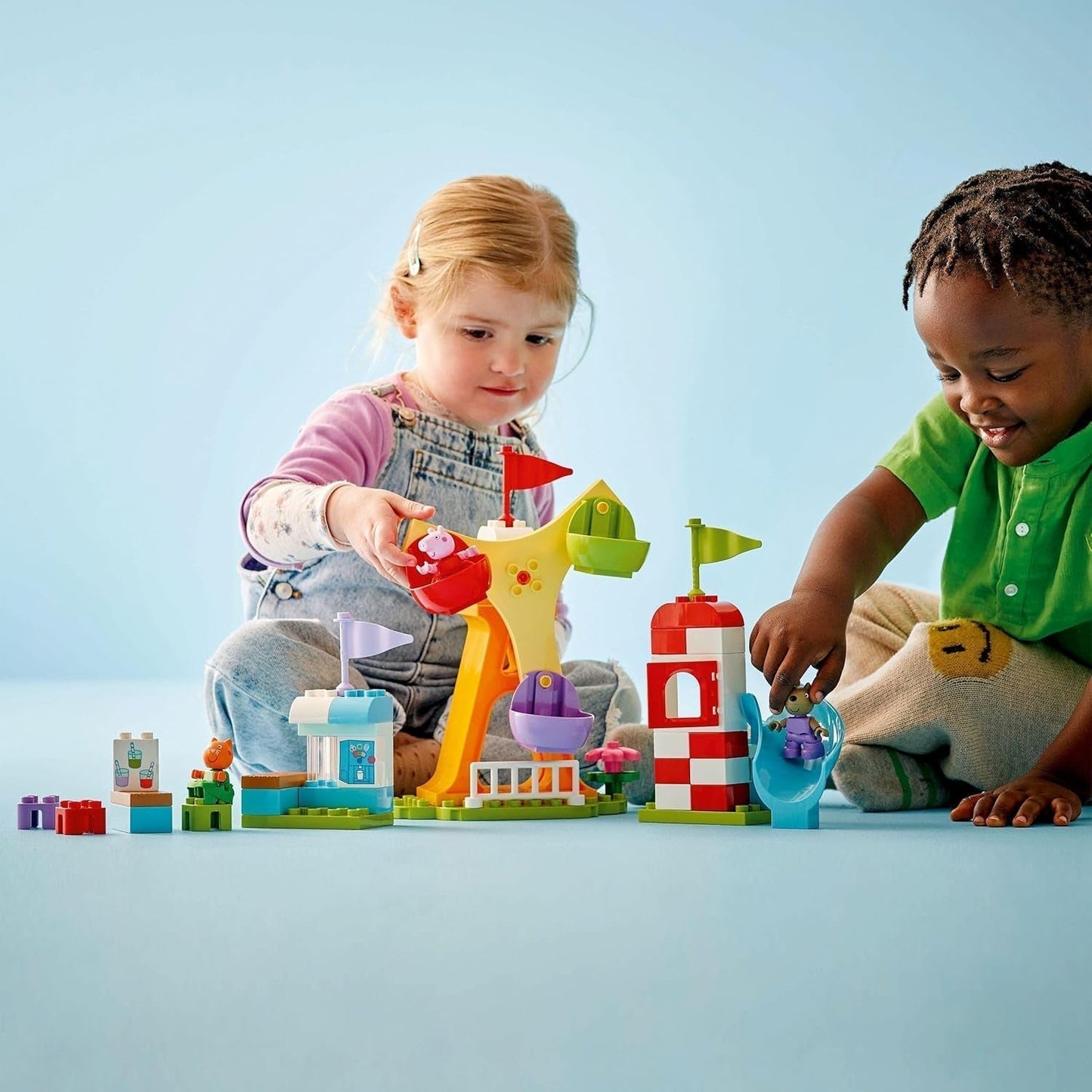 LEGO DUPLO Výstaviště Peppa Wutz - Dětské hračky a motorické hračky pro děti od 2 let - Předškolní hry s velkým kolem, skluzavkou a 3 figurkami včetně Mollie Kitty a Klausi Kläff - Dárek pro děti 10453 Stavebnice Besuche den LEGO-Store