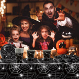 49dílná sada papírových příborů Halloween Spider včetně talířů, ubrousků, sklenic a ubrusu. Černá sada nádobí s dezertními talířky, ubrousky a skleničkami.