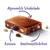 Milka Grapes and Hazelnuts – Čokoláda z alpského mléka s kousky lískových oříšků a rozinek – 90g