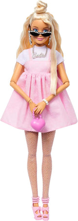 Panenka Barbie Deluxe Style č. 3 with Barbiecore outfit, blonde hair in a high bun, pastel pink dress with oversized bow and accessories like fishnet tights, HYV27