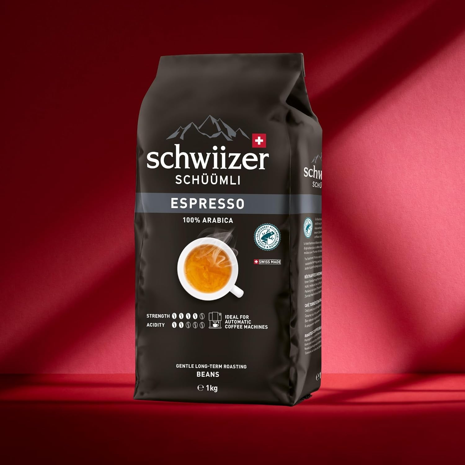 Schwiizer Schüümli Espresso, 100% zrnková káva Arabica, silná a intenzivní, ideální pro automatické espresso stroje, síla 4/5, středně pražení, Rainforest Alliance, 1kg