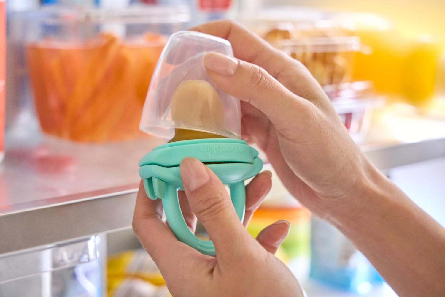 Dětský silikonový dávkovač potravin Munchkin | Ideální na cesty – silikonové sáčky na mražené potraviny | Samokrmný dávkovač potravin | Krmítko pro odstav | Bez BPA | Od 4 měsíců+ | Balení po 2 | Modrá a zelená