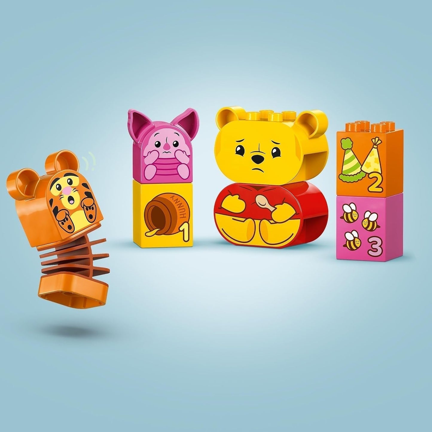 LEGO DUPLO - Narozeninová párty Disneyho Medvídka Pú - vzdělávací hračka pro předškoláky - sada 3 minifigurek včetně Medvídka Pú, Tygra a prasátka - tip na dárek pro chlapce a dívky od 1,5 roku 10457 Beuche stavebnice v LEGO-Store