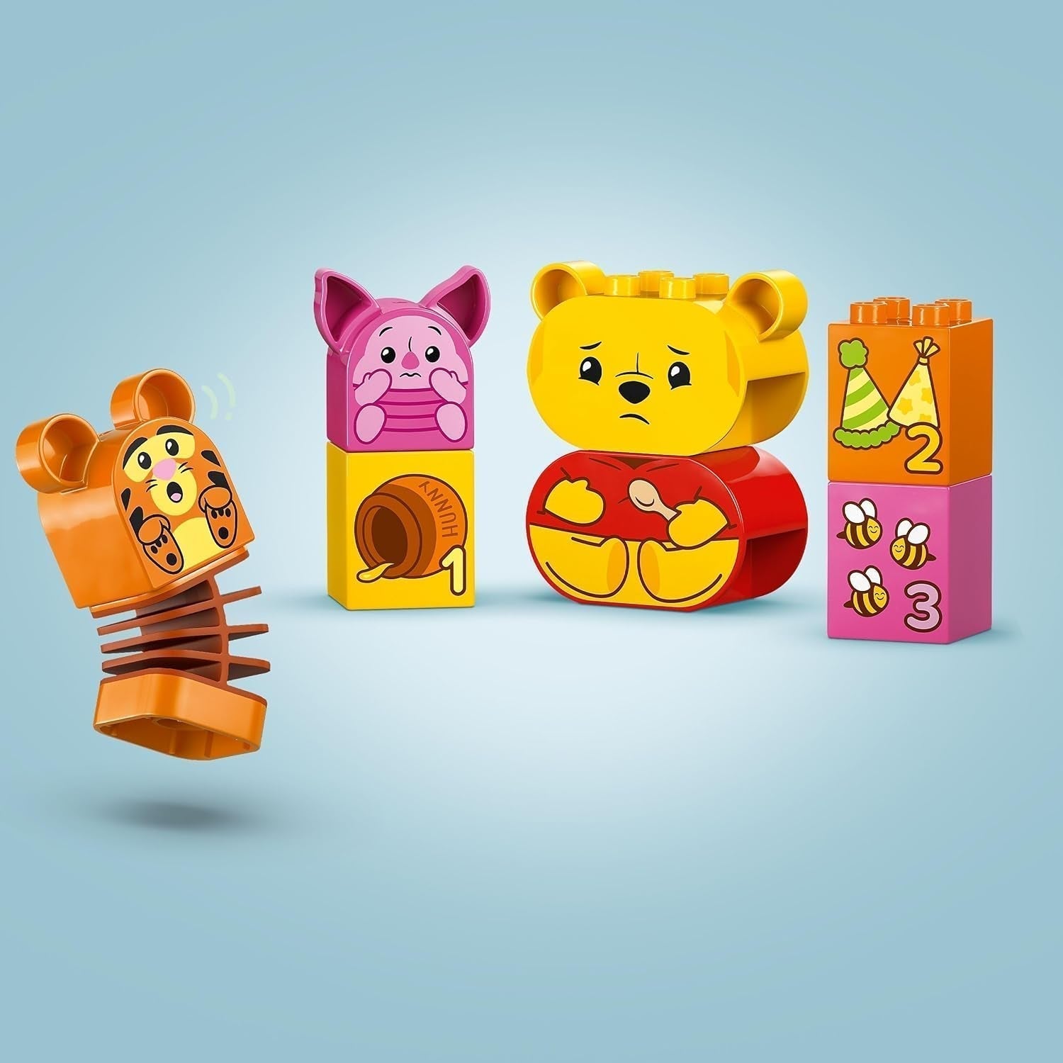 LEGO DUPLO - Narozeninová párty Disneyho Medvídka Pú - vzdělávací hračka pro předškoláky - sada 3 minifigurek včetně Medvídka Pú, Tygra a prasátka - tip na dárek pro chlapce a dívky od 1,5 roku 10457 Beuche stavebnice v LEGO-Store