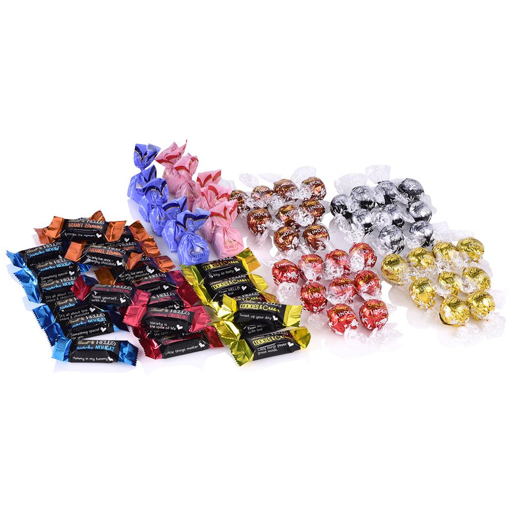 Čokoládový sortiment (37 kuliček LINDOR, 24 Hello Mini tyčinek, 10 Mini Fioretto), čokoládový dárek (1 x 815 g) a HELLO Mini Emoti, mléčná čokoláda v 5 designech emotikonů, 164 g