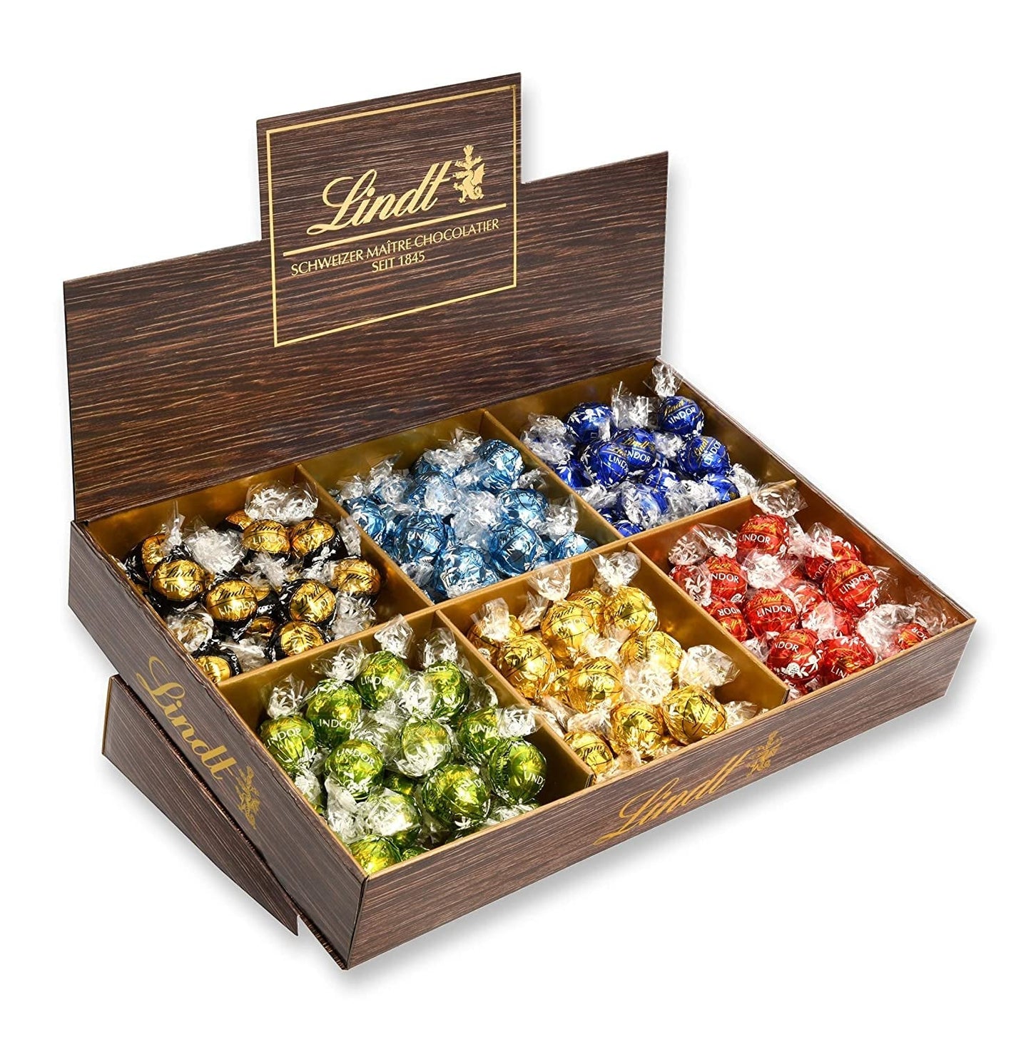 Lindor Čokoláda Top Prezentace | 1718 g a čokoládové tyčinky s marcipánem | 25 barů x 50 g v počítadle | 1250 g | Čistý marcipán potažený hořkou čokoládou | Čokoládové tyčinky