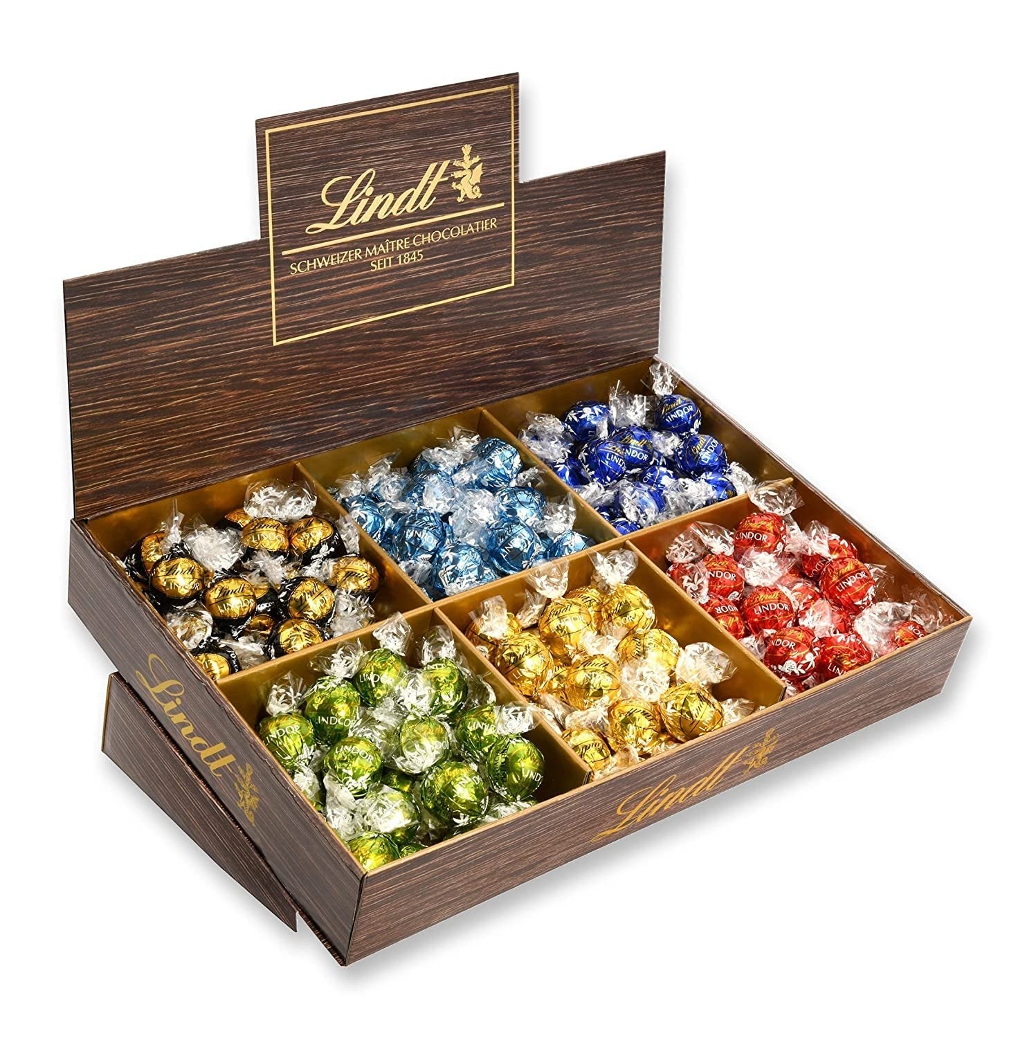 Lindor Čokoláda Top Prezentace | 1718 g a čokoládové tyčinky s marcipánem | 25 barů x 50 g v počítadle | 1250 g | Čistý marcipán potažený hořkou čokoládou | Čokoládové tyčinky