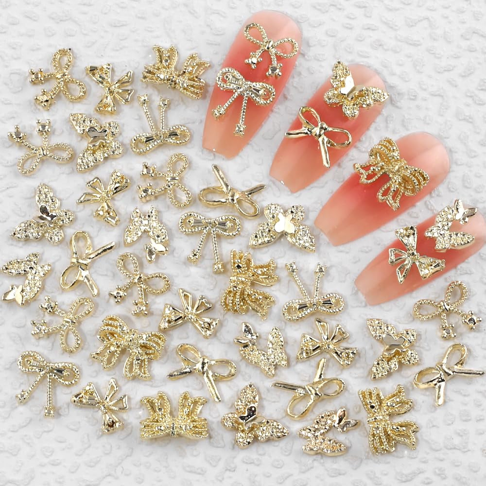 50Stück 3D zlatá mašle na nehty Butterfly Nail Art Charms Legierung Bogen Nagel Charms Nägel Zubehör Schleife Nagelschmuck Metall Schleifen Schmetterling Nageldesign Nagelanhänger Nailart Strasssteine