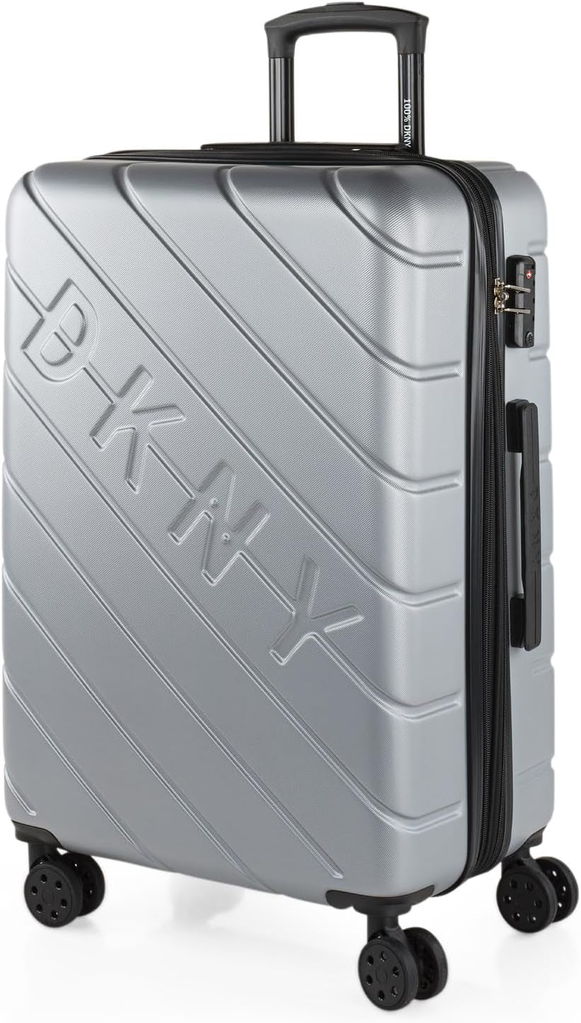 DKNY - Velký kufr na 4 kolečkách Velký lehký kufr - Velký cestovní kufr na kolečkách. Velký cestovní kufr do letadla Pevný skořepinový kufr s certifikovaným zavíráním - Velký kufr na kočárek Stříbrný Naty Shop Zavazadla a cestovní vybavení Stříbrný M