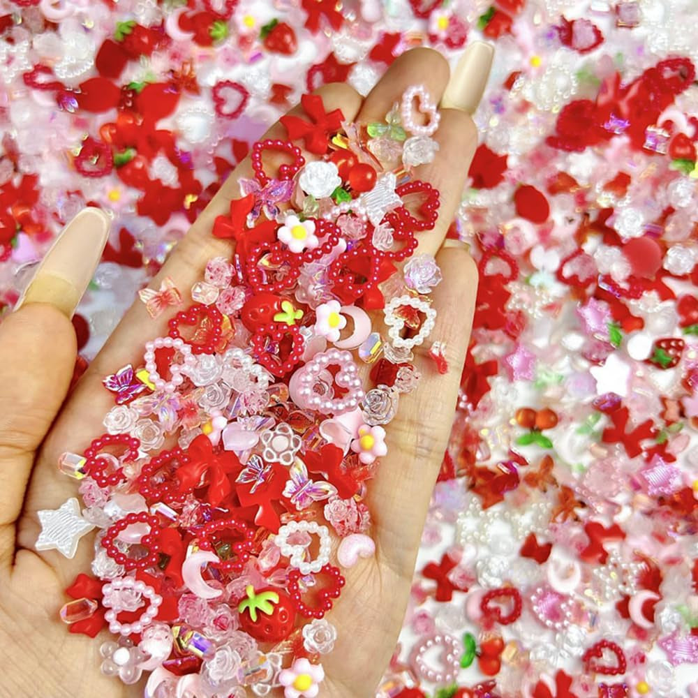100ks 3D kouzla na nehty Rosa Rot Kirsche Erdbeere Blume Přívěsky na nehty Kamelie Rose Schmetterling Přívěsky na nehty Flatback Herz Schleife Charms Nägel Zubehör Mond Stern Nagelschmuck Nageldesign Anhänger