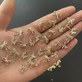 50Stück 3D zlatá mašle na nehty Butterfly Nail Art Charms Legierung Bogen Nagel Charms Nägel Zubehör Schleife Nagelschmuck Metall Schleifen Schmetterling Nageldesign Nagelanhänger Nailart Strasssteine