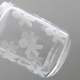 Alessi AKK37 GIROTONDO Skleněná kuchyňská dóza s potiskem a utěsněným nerezovým víčkem, L 21,6 cm, V 10,5 cm Dózy na potraviny Naty Shop