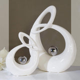 GILDE Dekorativní keramická plastika Život - bíle glazovaná bílo/stříbrná figurka se stříbrnou kuličkou - výška 22 cm Sošky a plastiky Naty Shop